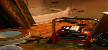 Colorado springs clogged mainline This mainline clog had to been run by removing basements bathroom toilet to clear the drain clog.