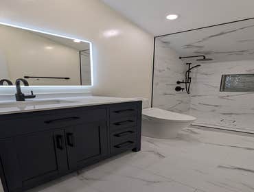 Bathroom with spacious standing shower.