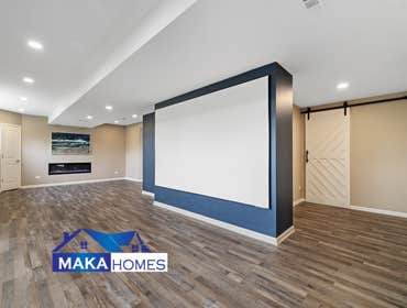 Photos by Maka Homes Inc #1 2000 sq ft with bathroom, bar, gym, theatre, and bedroom.