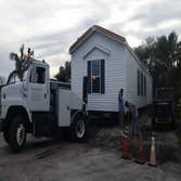 Photos by Blanchard's Mobile Home Removals and Transport Inc #1 New Clayton 16' X 76' Single wide Manufactured Home Spread Base Pad For Home, position 