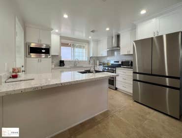Timeless White Shaker Kitchen Remodeling Timeless Open Concept White Shaker open concept Kitchen Remodeling with a custom closet