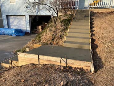 Photos by Stamped Concrete Denver LLC #1 Stamped concrete, often called textured or imprinted concrete, replicates the look of many different stones su