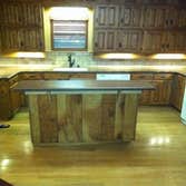 Bookout kitchen project Solid Surface countertops with undermount sink and tile splash.
