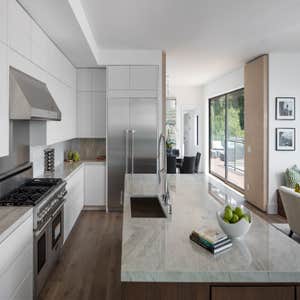 Tiburon house Install hardwood flooring throughout house - wide plank white oak with cured urethane finish