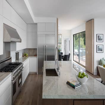 Tiburon house Install hardwood flooring throughout house - wide plank white oak with cured urethane finish