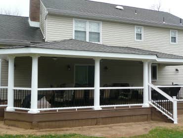 COVERED DECK This was the addition of 65' deck with formal roof.
-Finish decking and railing was composite material
-3 fans and appropriate lighting 