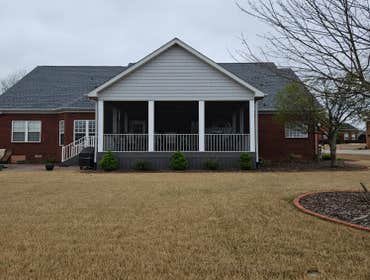 Screen porch and roof addition Removed old deck. Built new roof and composite deck. Installed high end aluminum screen room enclosure