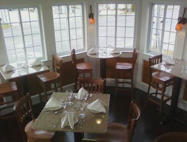 Restaurant addition On this project, we took the front deck of the restaurant, closed it in with lots of windows, trim and hardwood to expand the loung