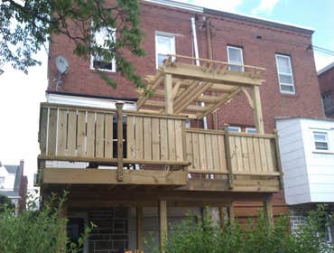 Photo(s) from Laur Moor Construction Two decks and a tiled kitchen floor