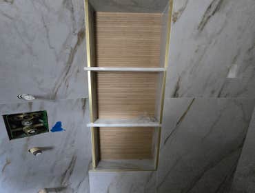Photos by MC ALISTER TILE #1 5 showers total, was hired after another handyman did not water proof correctly, fixed all water proofing and installed 