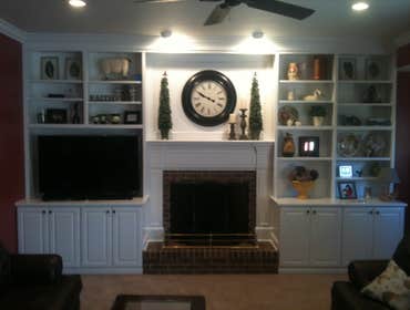 Project photos from Sheward Construction And Remodeling Custom built in Cabinets, everything is custom built except for the crown molding. The homeowne