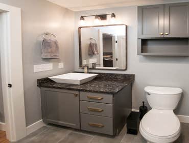Master Bath Renovation This existing bathroom was a tight fit in this Durham residence - almost no storage was provided and an outdated fiberglass show
