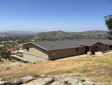 Photos by TCE CONSTRUCTORS INC #2 Design / Site Development / Build 2500sf custom home on 2.75 acre vacant hillside lot overlooking Lakeside, CA