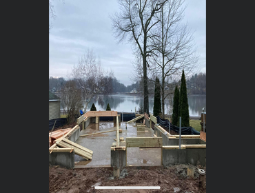 Photos by United Tradesman LLC #1 Lake house build, frame to finish.