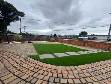 Photos by Landscaping La Economica LLC #1 Installed artificial turf, paver stone walkway, decorative mulch, and a new wooden fence. This project provid