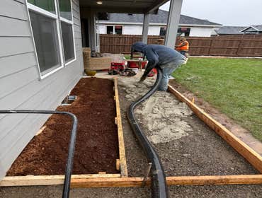 Photos by Tyeco Home Services LLC #4 Back yard hard scraping walls and curb, RV pad, Front paver walkway