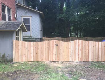 4' tall western red cedar scalloped solid fence. Orvilla Road, Chester county, Pa Western Red Cedar scalloped solid board fencing with (1) 4' gate and 