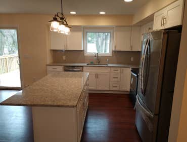 Kitchen Removed load bearing wall to create open concept.
