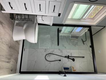 Small Bathroom Remodel Helped the owners split their only bathroom and surrounding closets into two bathrooms (only Master Bathroom shown in photos) an