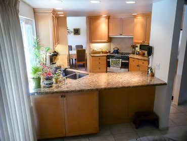 1998: Unusually Reshaped & Improved Kitchen This project started out like many, with existing narrow corridor kitchens (see before photo at the end of 