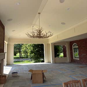Lambton Park Road, New Albany Addition of an attached, covered porch with concealed retractable screens. Full bluestone floor, limestone fireplace...