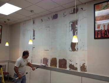PHOTO MURAL INSTALLATION POLLO CAMPERO WE PLASTER WALLS PRIME AND INSTALL NEW PHOTO MURAL ON THIS WALL