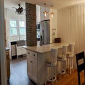 Photos by E.S.H.I. Builders, LLC #3 Kitchen remodel, new flooring in kitchen, refinish other floors, and paint throughout.