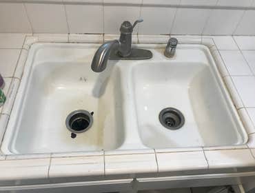 Kohler Kitchen sink @Repair Sink replacement and related plumbing work.