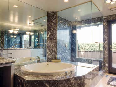 1994: Mountain Marble Master Bath In this bathroom we completely redesigned the tub and shower area while doing only cosmetic changes in the other area