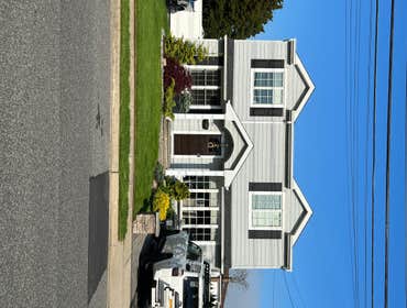 Photos by Premier Builders & Construction #7 Half dormer with (2) reverse gables and a front portico on an existing cape home