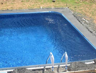 Photos by Dunn Landscape Construction #1 After initial pool installation provide all hardscape including retaining walls, pool deck, walkways and plant