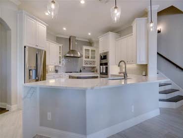 Photos by The Design House - Flooring, Countertops & Remodeling #1