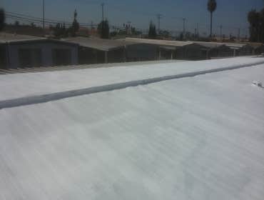 Elastomeric white roof coating