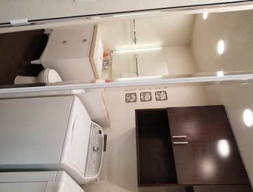 V. Jones Bathroom/Laundry Room Remodel - Tub to Step-in Shower Conversion with Linear Drain
- New Vanity, Toilet, Sink, mirror, toiletries
- All new fl