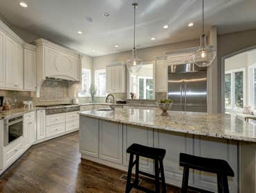 GULICK | CUSTOM Home in McLean The impressive stone and HardiePlank® elevation on our Winthrop really stood out on this corner lot of approximately one