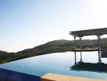 Photo(s) from CUSTOM DERIAN POOLS Infinity Pools, Hillside Pools, Landscaping, BBQs, Outdoor Fireplaces, Shade structures, Pergolas, Landscaping, Mason