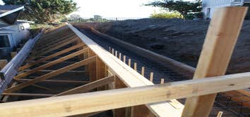 K Morales Construction Project interior remodels of bathrooms
Retaining wall on side of hill
Dual headed custom built shower