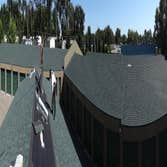 Carefree Storage Facility in Fridley Re-roof, custom fascia, and guttering on large commercial project.