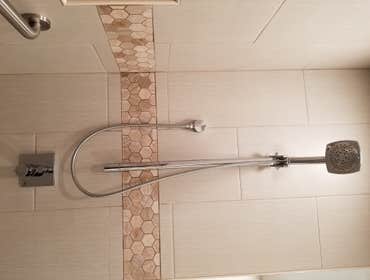 V. Jones Bathroom/Laundry Room Remodel - Tub to Step-in Shower Conversion with Linear Drain
- New Vanity, Toilet, Sink, mirror, toiletries
- All new fl