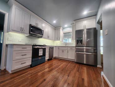 Joan's Kitchen - by Paz Builds Full Gut Kitchen Remodel.
Kitchen was stripped down to studs and subfloor with bulkheads removed.
Installed:
Oak hardwoo