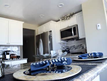 Beach Style Kitchen & Bathroom Remodel with Bay View Window Installation