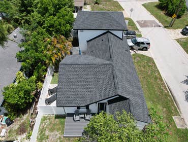 Photos by WOODSTONE ROOFING
