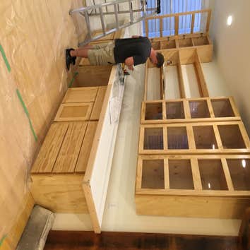 Photos by It's Up to Her, LLC #1 Convert 1800 sq ft of storage space behind commercial location into 2 apartments with 2 bedroom, 2 bath, custom cabine