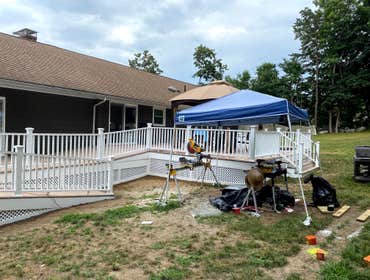 Photos by Kmas Construction LLC #3 The removal of the existed exterior and the reinstallation of larger deck with new banisters with PVC wrap