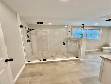 Photos by Lightship Development LLC #1 Complete remodel due to flood. Reconfigured master bathroom floor plan to accommodate over sized walk in shower.