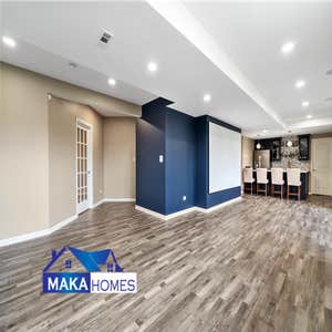 Photos by Maka Homes Inc #1 2000 sq ft with bathroom, bar, gym, theatre, and bedroom.