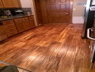 Photo(s) from Cam's Construction knotty hickory hardwood floor