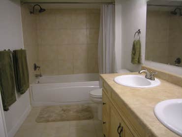 Remodeled 3/4 bath and dark room This 3/4 bath was probably from the 70's when the home was built. A dark room sink was in the closet behind it. Co