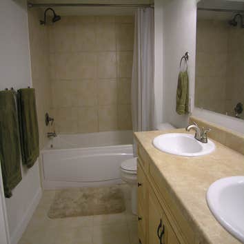 Remodeled 3/4 bath and dark room This 3/4 bath was probably from the 70's when the home was built. A dark room sink was in the closet behind it. Co