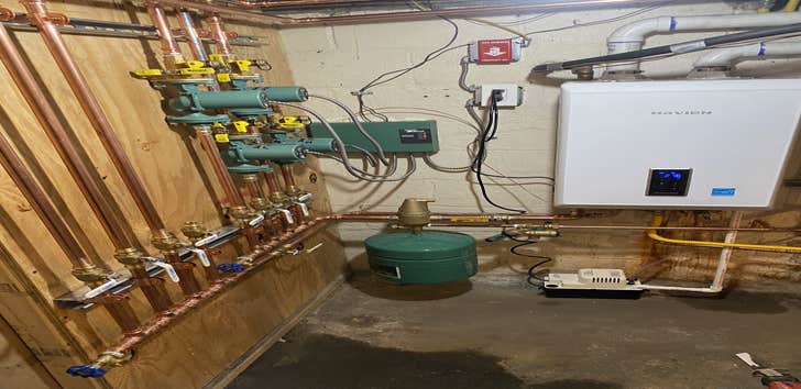 Navien Combi Boiler Install Installation of Navien Combi boiler with new circulator pumps and zone controller.